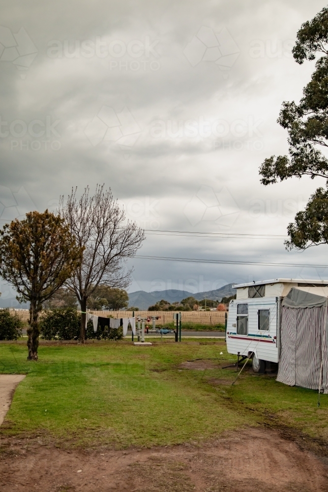 Clothes drying on makeshift washing line at caravan park - Australian Stock Image