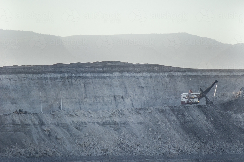 Coal Mining machinery digging in an open cut mine - Australian Stock Image