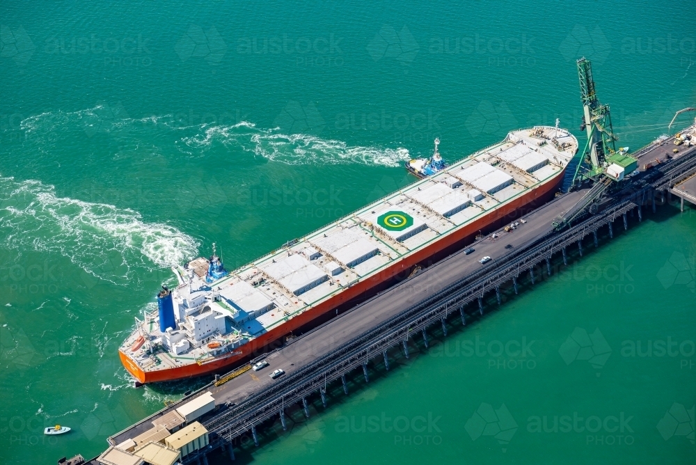 Coal ship docking at RG Tanna wharf, Gladstone, Queensland - Australian Stock Image