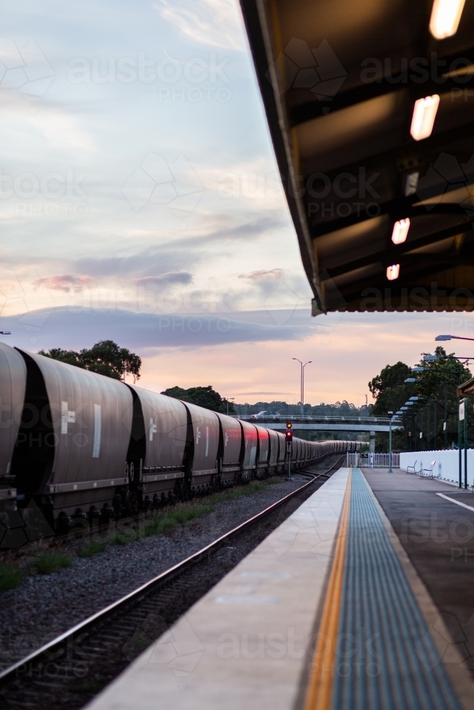 Coal train passing Singleton station in the Hunter Valley - Australian Stock Image