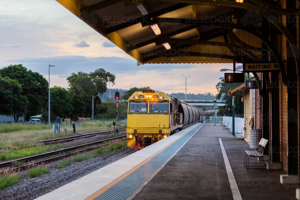 Coal train passing Singleton station in the Hunter Valley - Australian Stock Image