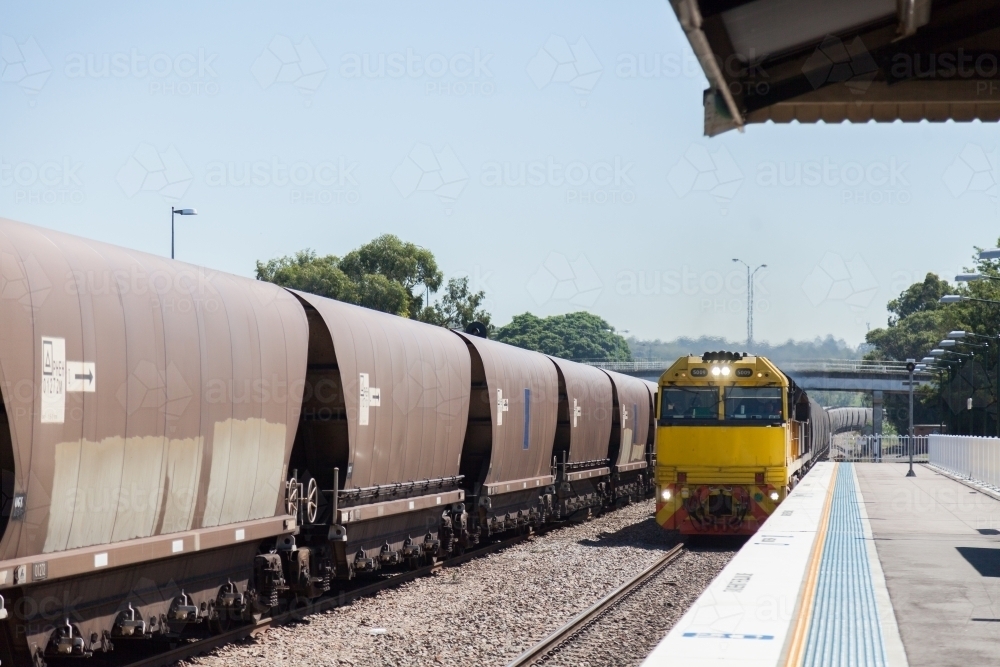 Coal trains passing singleton train station - Australian Stock Image