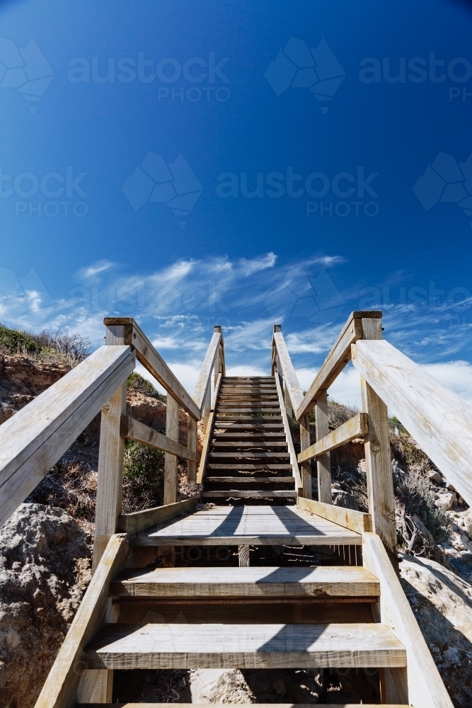 Coastal Steps up to blue sky at the seaside - Australian Stock Image