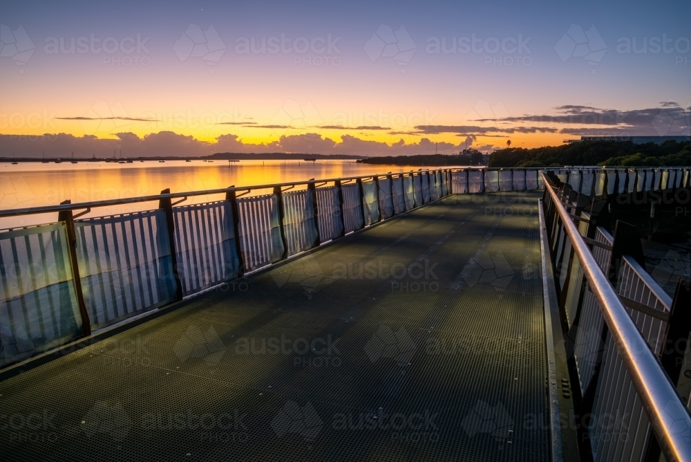 Coastal walkway bridge at sunrise / blue hour - Australian Stock Image