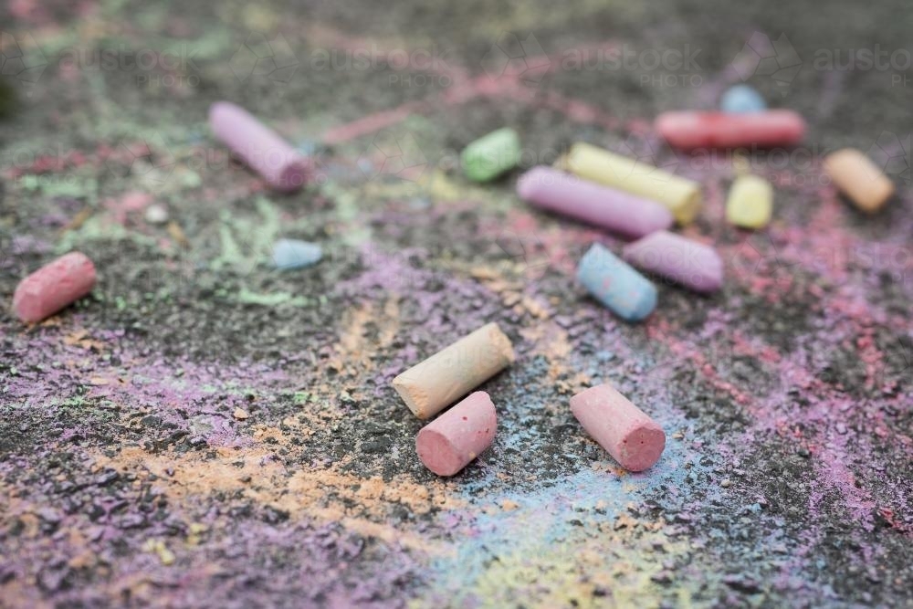 Coloured Chalk Scribbles on rough surface - Australian Stock Image