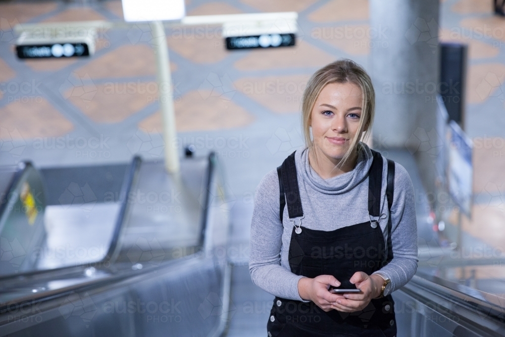 Commuter Coming up the Escalator - Australian Stock Image