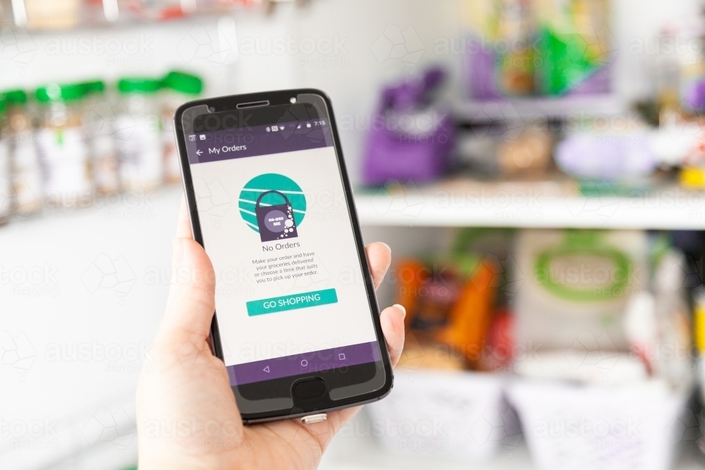 Contactless delivery phone screen app concept for online shopping - Australian Stock Image