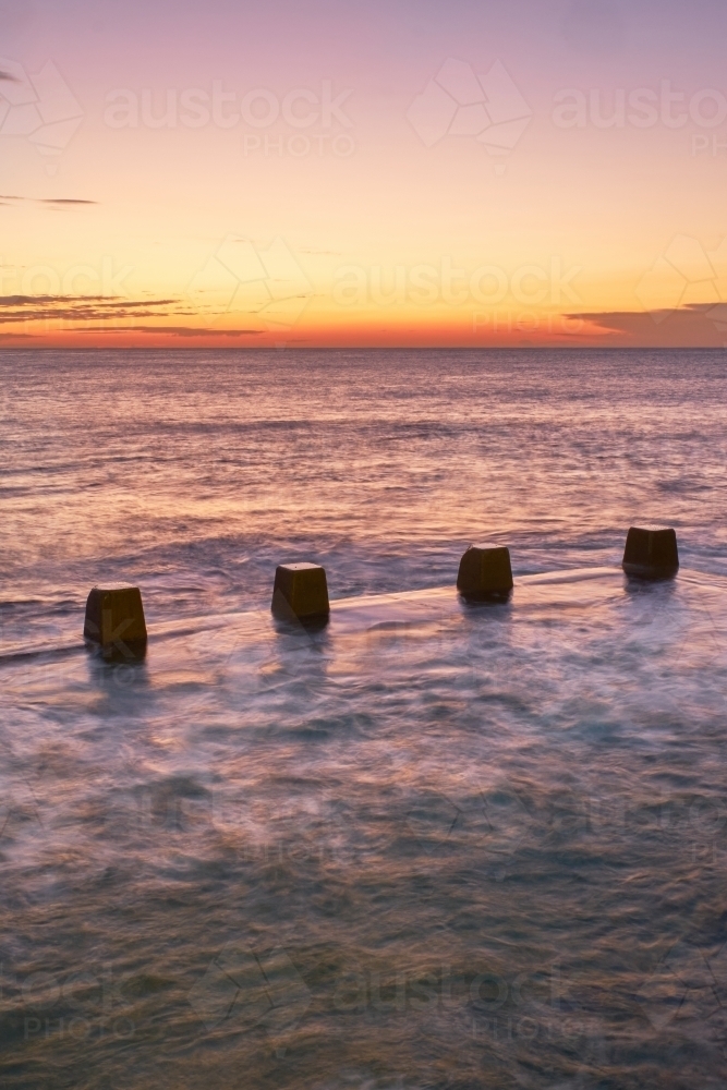 Image of Coogee Rock Pool at sunrise - Austockphoto