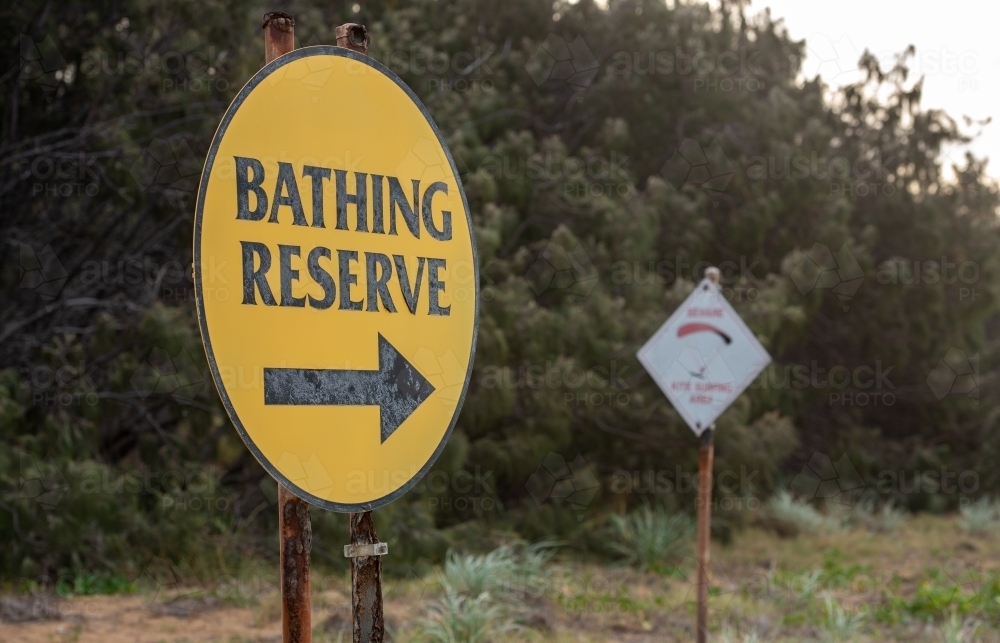 corroded bathing reserve sign on Tannum Sands beach - Australian Stock Image