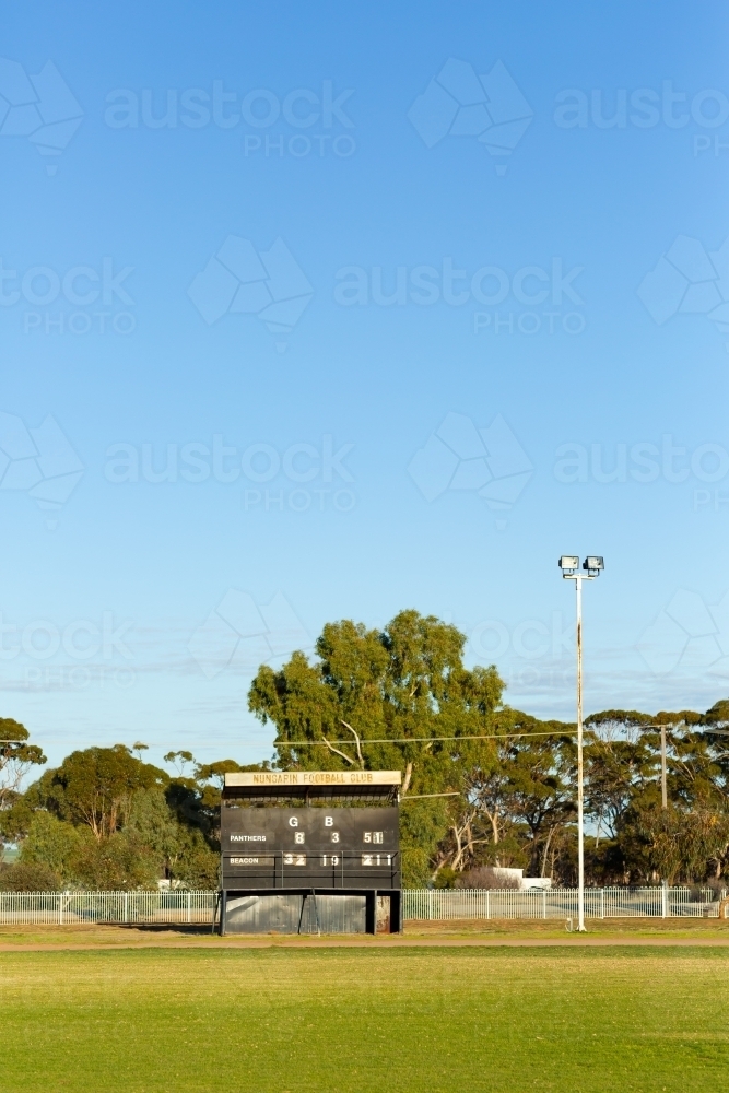 country football oval with scoreboard - Australian Stock Image