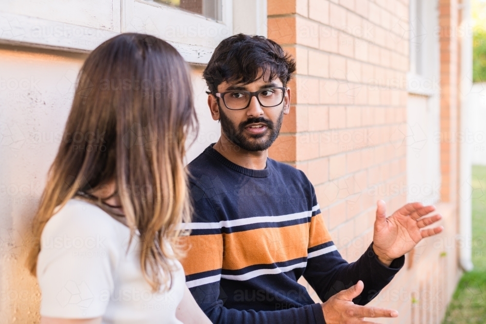 couple in conversation - Australian Stock Image