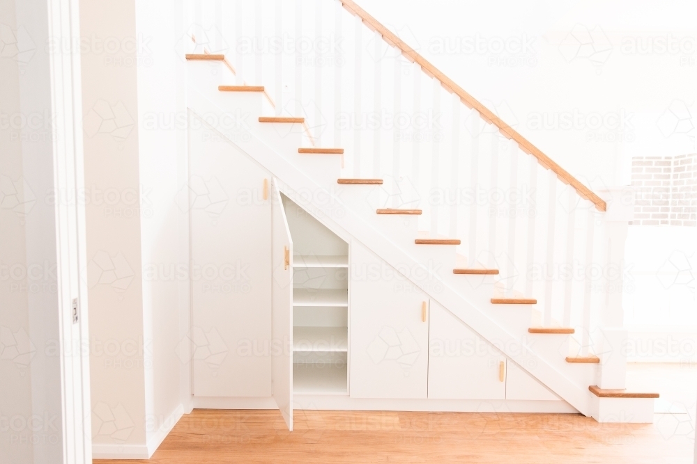 cupboard under the stairs - Australian Stock Image