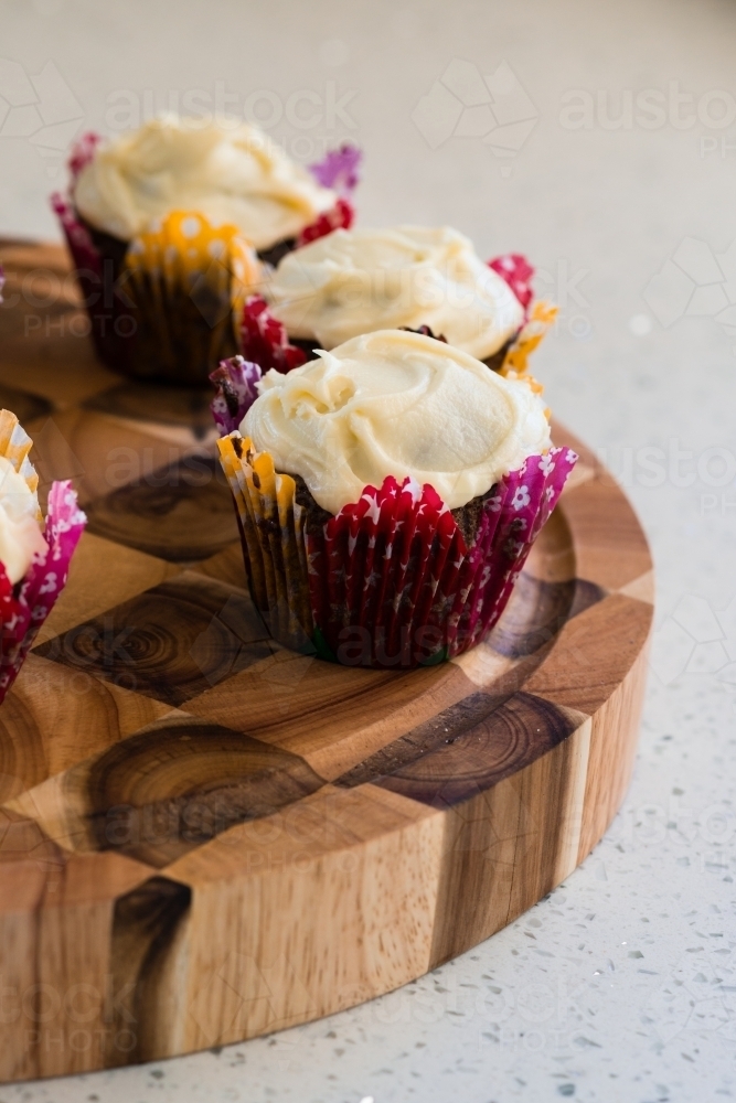 cupcakes with vanilla icing - Australian Stock Image