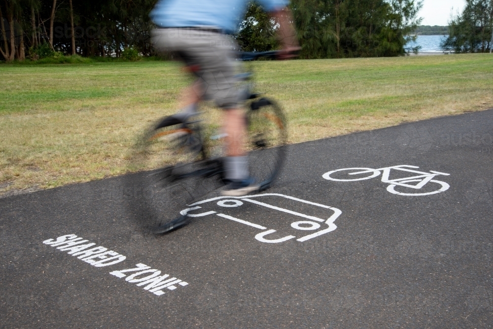 Cycle path shared zone with bike rider - Australian Stock Image