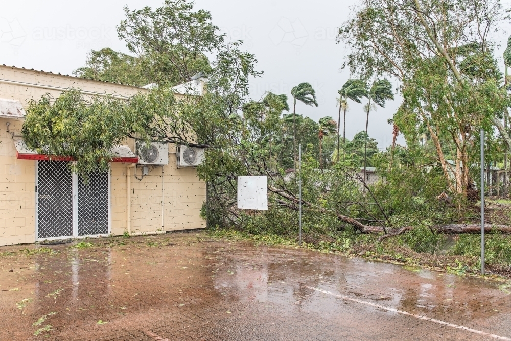 Damage from cyclone on business building - Australian Stock Image