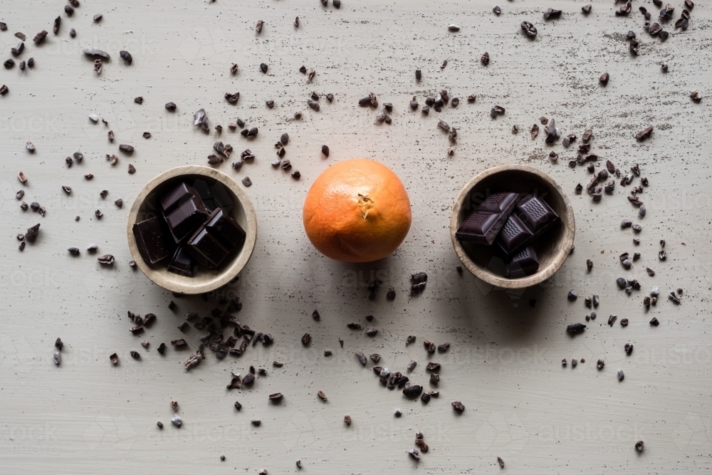 dark chocolate and an orange - Australian Stock Image