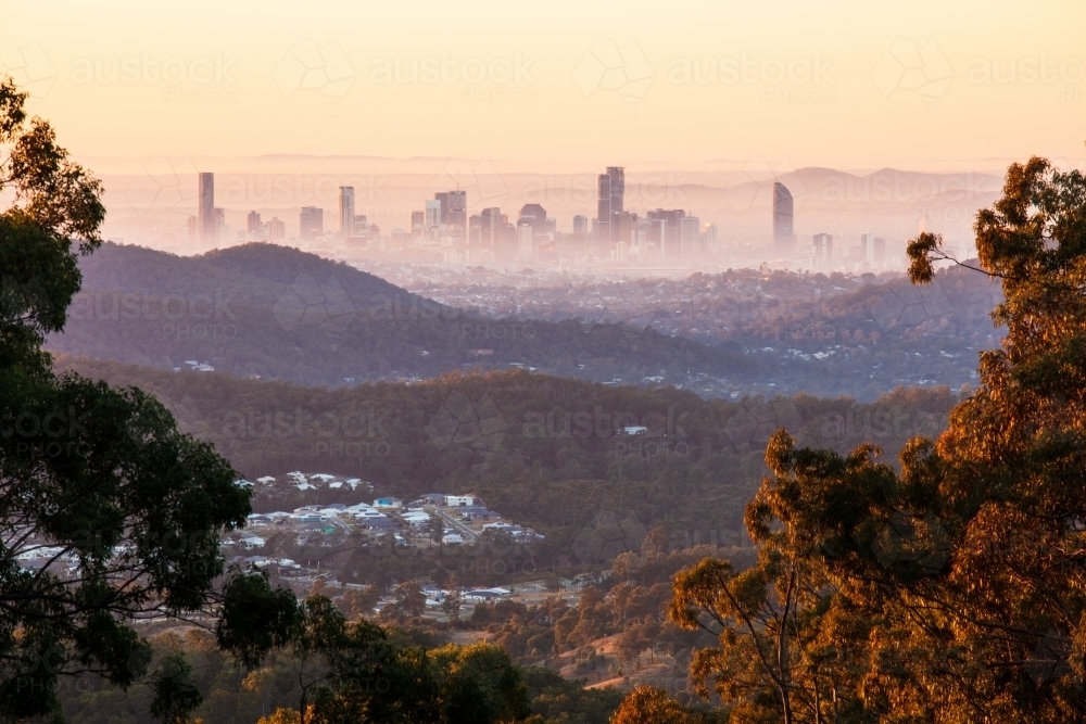 Dawn over Brisbane City from an elevated lookout near the northern reaches of the city. - Australian Stock Image