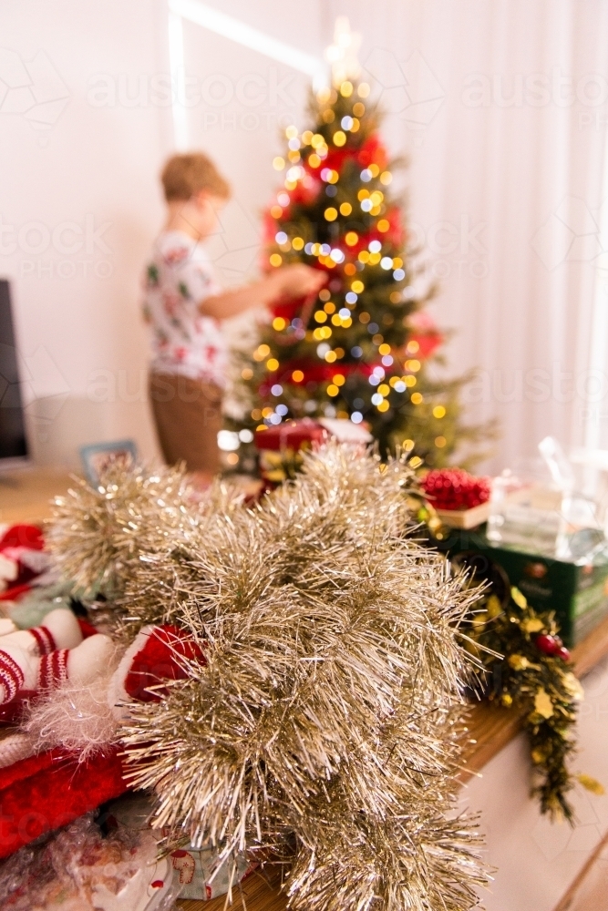 decorating the christmas tree with kids - Australian Stock Image