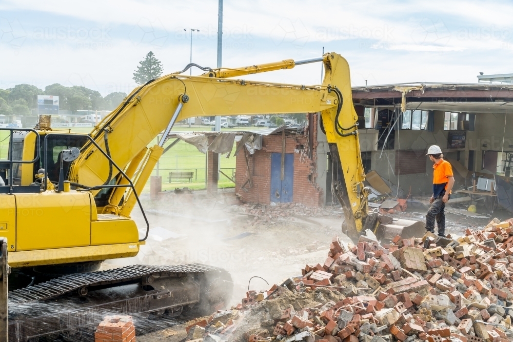 Demolition machinery working on a construction site - Australian Stock Image