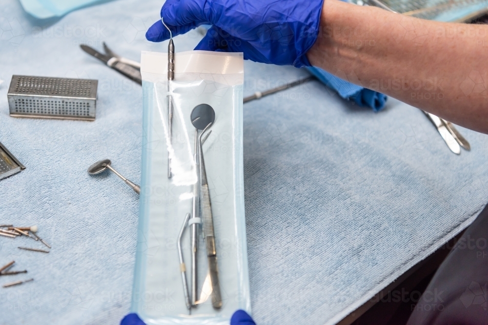 Dental instruments ready to be autoclaved - Australian Stock Image