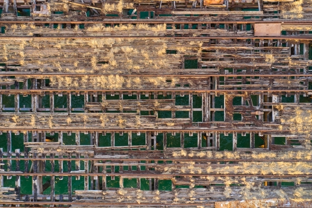 Derelict jetty falling to pieces - Kwinana Bulk Jetty - Australian Stock Image