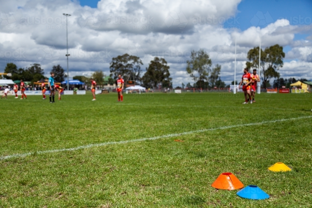 Detail of colourful cones on sporting field - Australian Stock Image