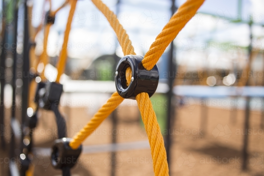 Detail of rope on playground climbing net - Australian Stock Image