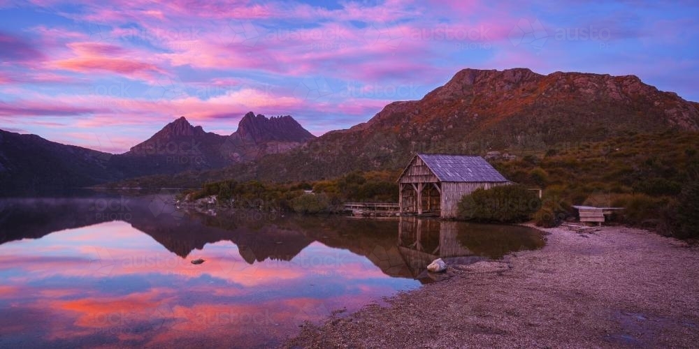 Dove Lake and boatshed at dawn - Australian Stock Image