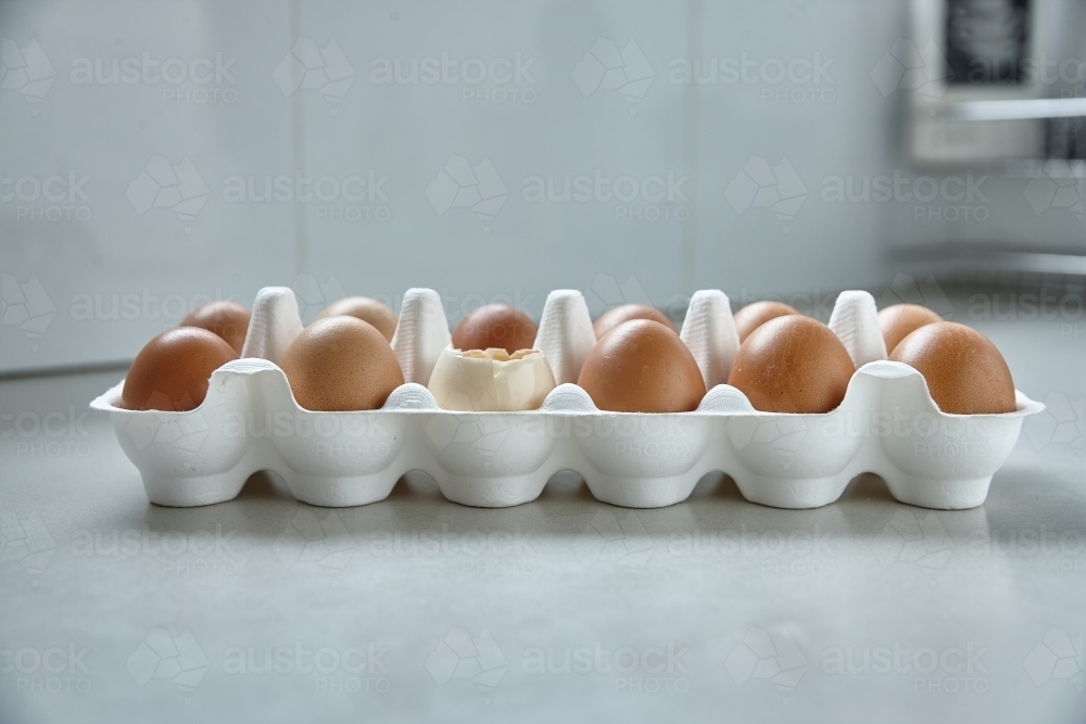 Dozen eggs in paper carton - Australian Stock Image