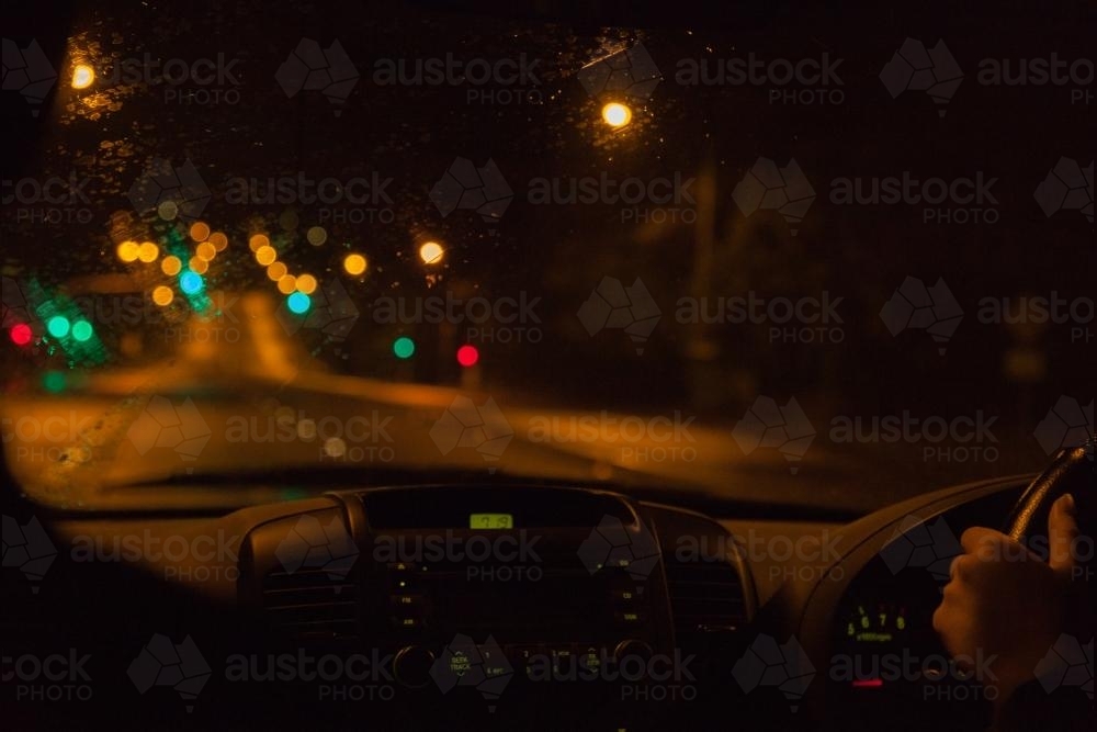 Driving in the rain late at night - Australian Stock Image