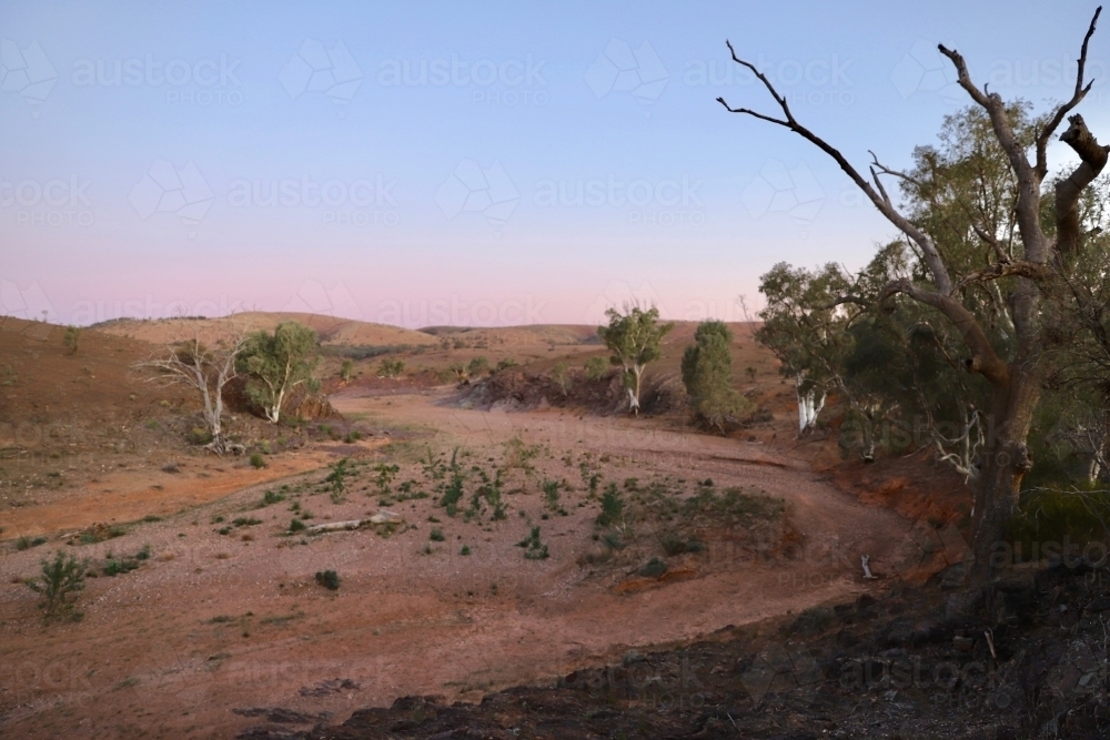 dry creek bed at sunset - Australian Stock Image