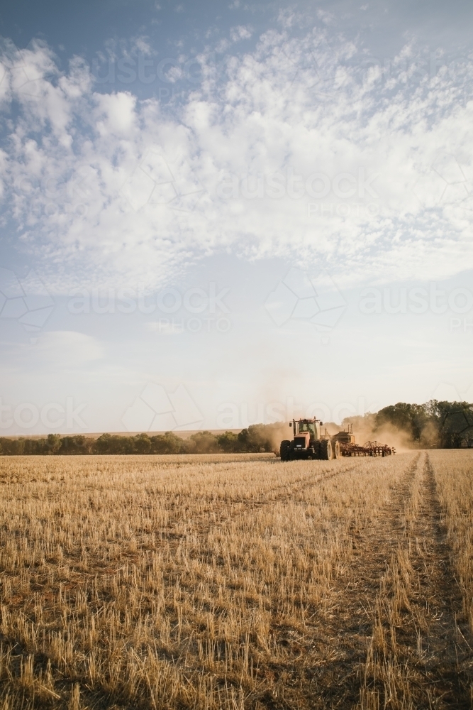 Dry seeding farm crop into stubble in the Avon Valley of Western Australia - Australian Stock Image