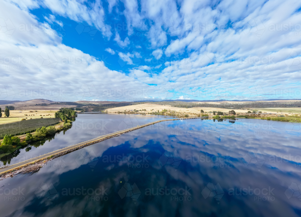 Dunrobin Bridge views of Meadowbank Lake and River Derwent on a cool summer's morning near Ouse - Australian Stock Image
