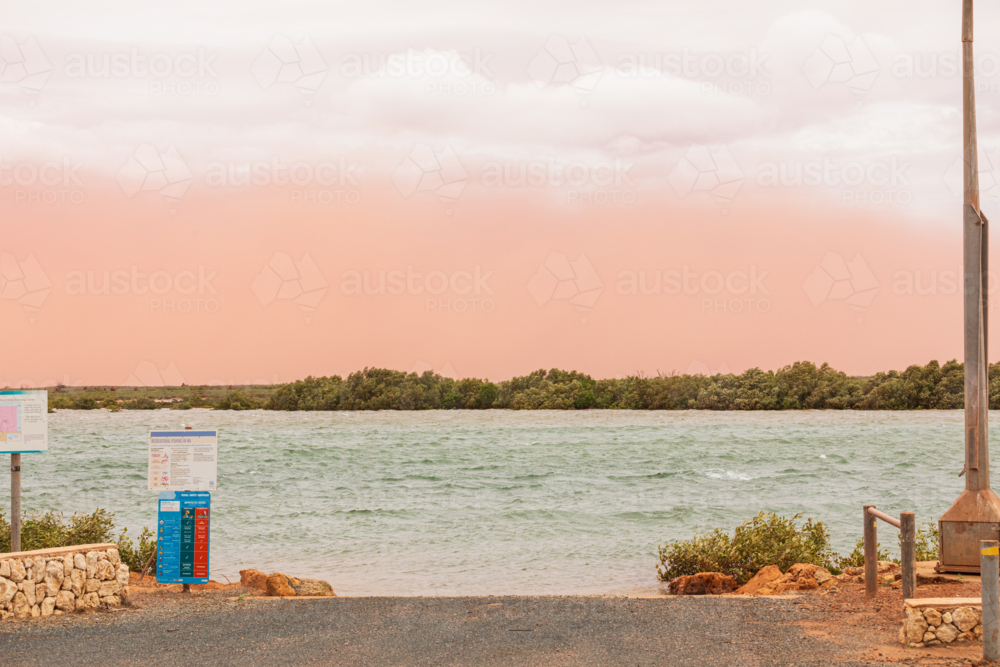 Dust storm at 4 Mile Creek, Onslow at the start of Cyclone Sean - Australian Stock Image