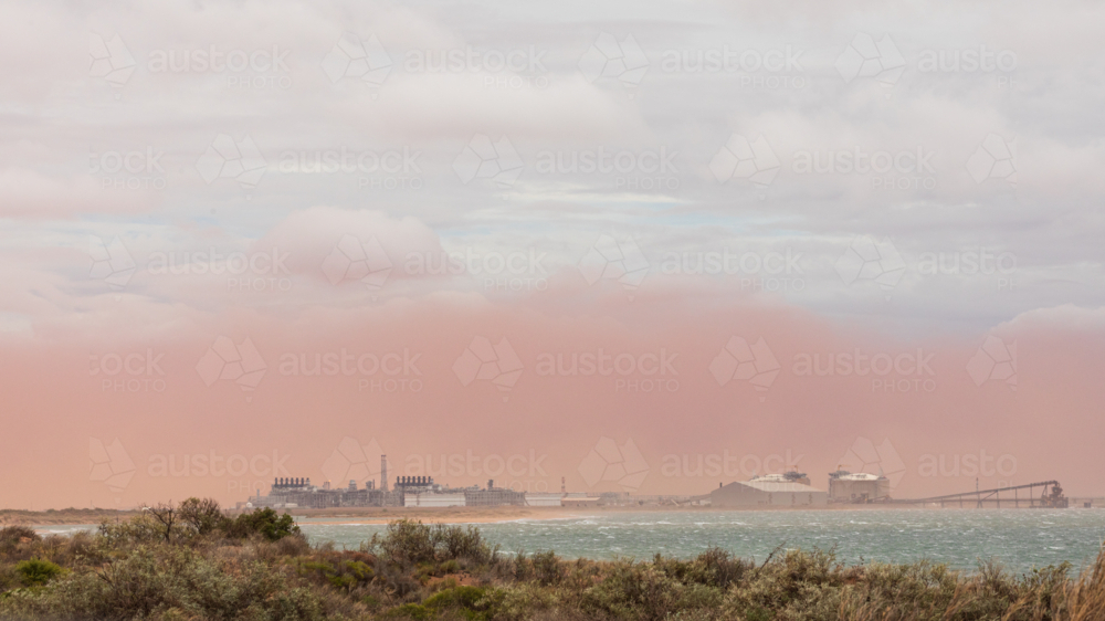 Dust storm rolling in at the start of tropical cyclone Sean - Australian Stock Image