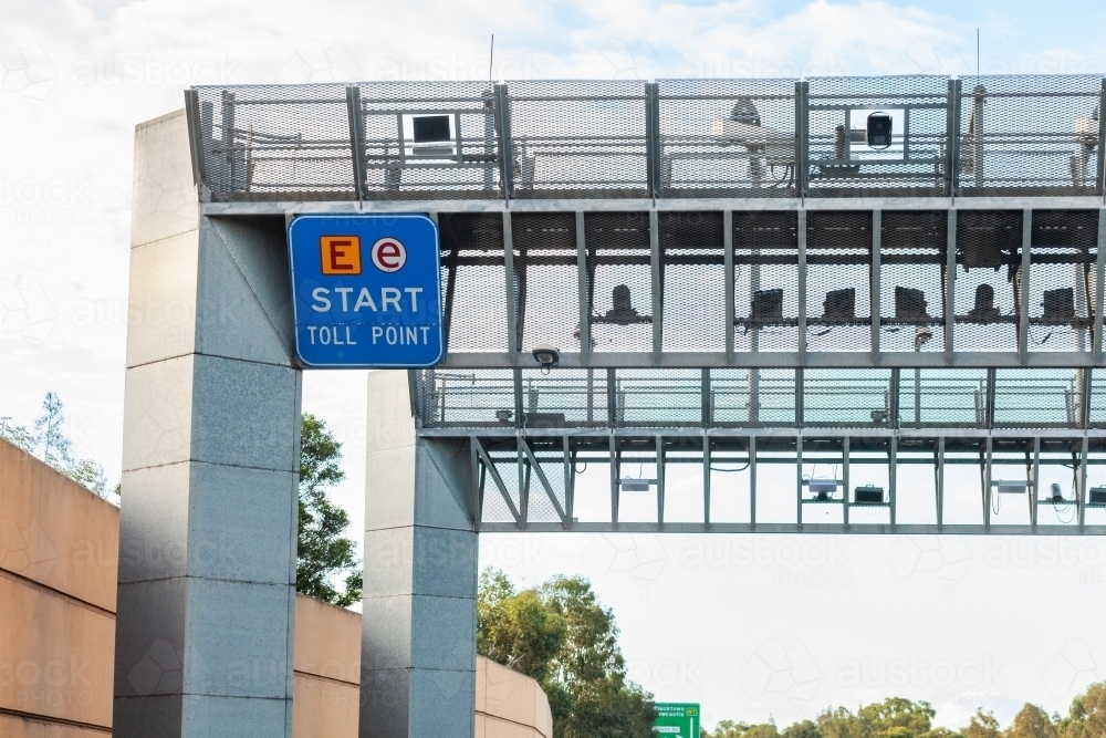 E-Toll tag point start on motorway entry with sign and cameras - Australian Stock Image