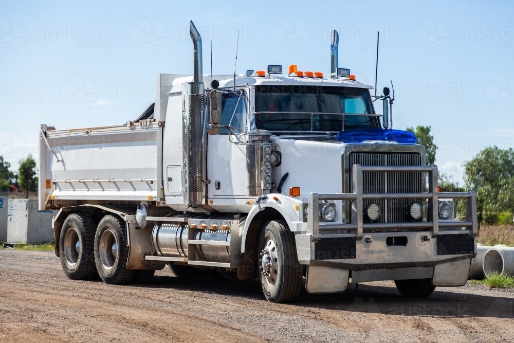 Earth moving truck on road - Australian Stock Image