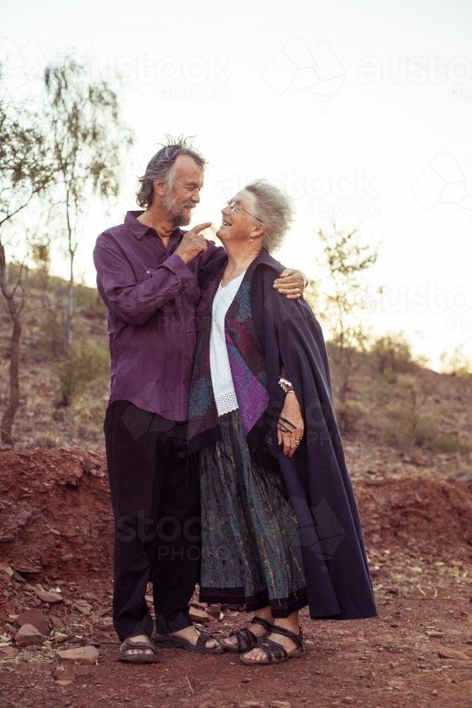 Elderly couple holding hands - Australian Stock Image