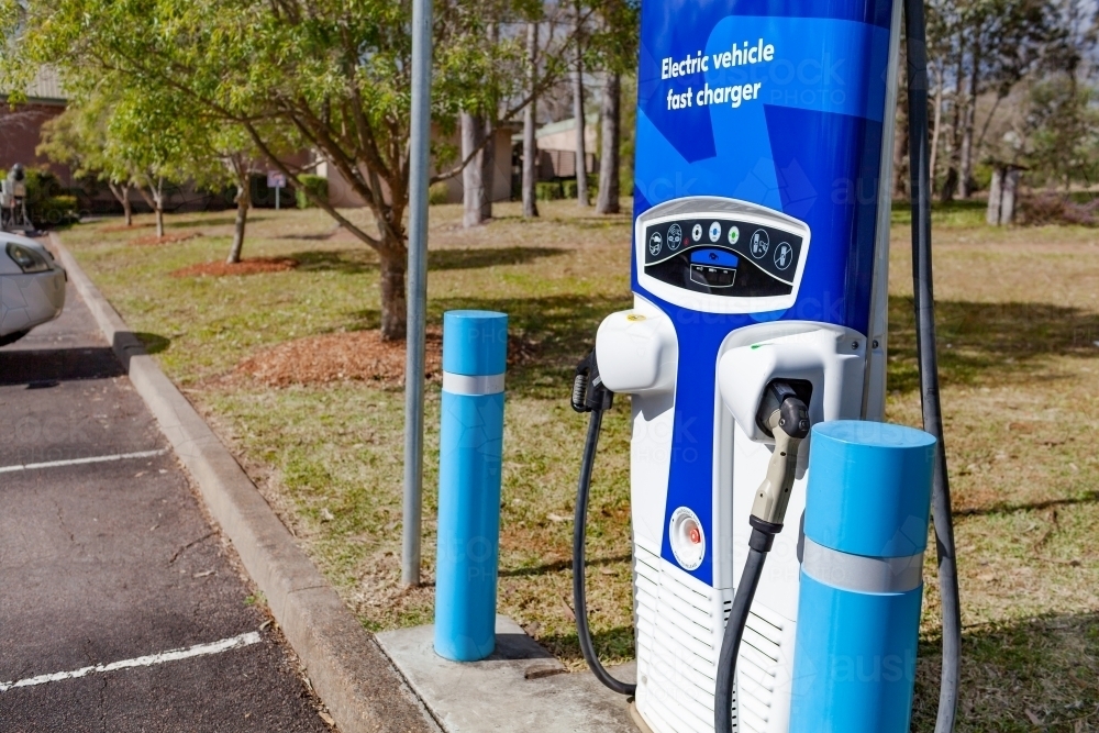 Electric vehicle fast charger station in carpark - Australian Stock Image