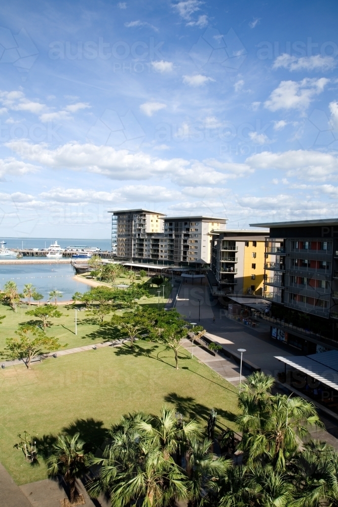 Elevated view of waterfront apartments and parkland surrounding Darwin harbour and lagoon - Australian Stock Image