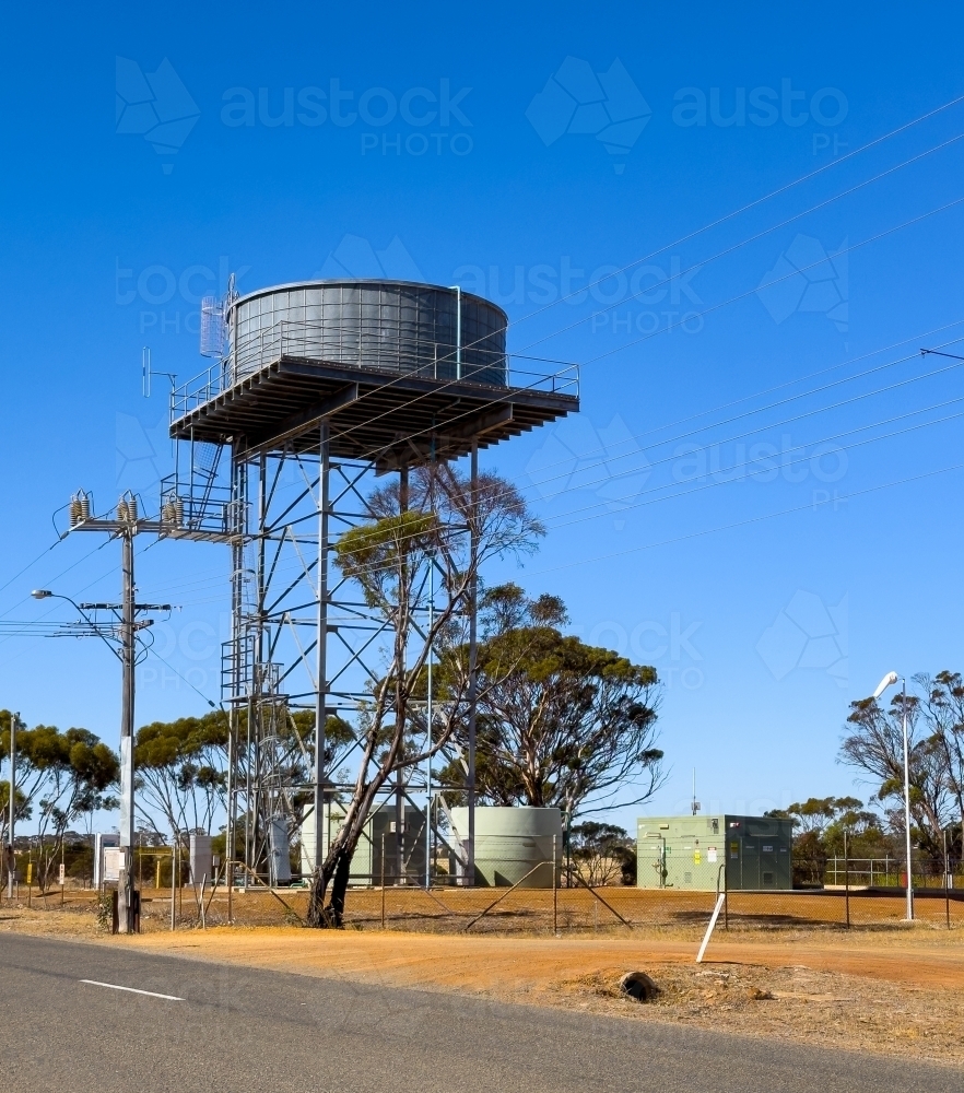 Elevated water tank and pumping equipment at Pingrup in Western Australia - Australian Stock Image