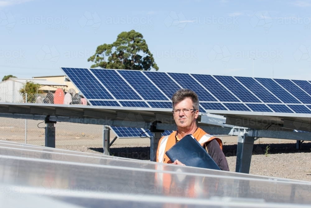 Employee at a Solar Panel plant - Australian Stock Image