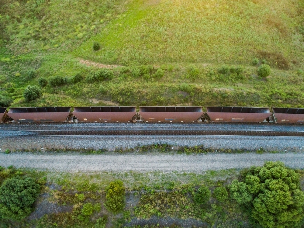 empty coal train carriages on track seen from above - Australian Stock Image