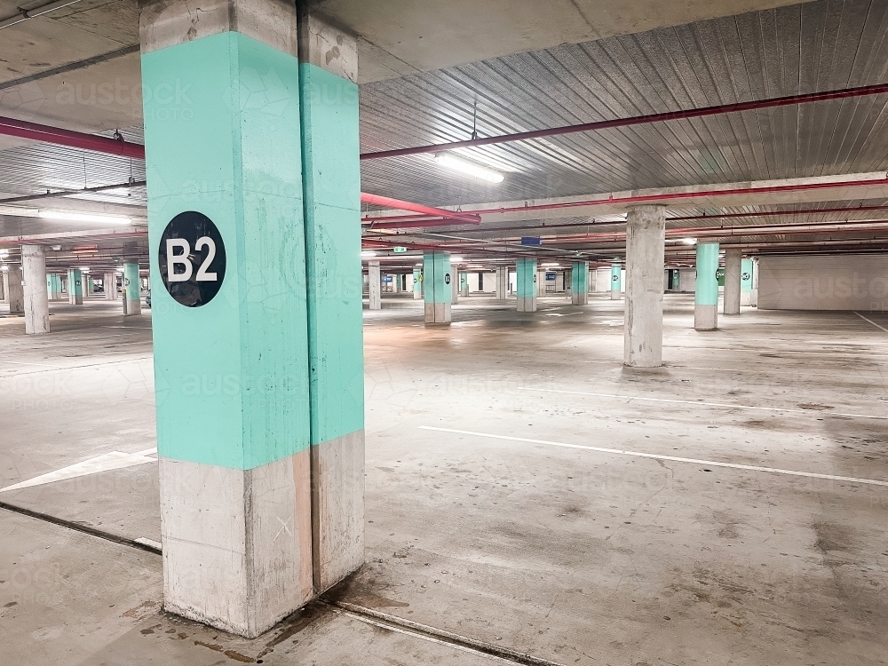 Image of empty shopping centre car park - Austockphoto