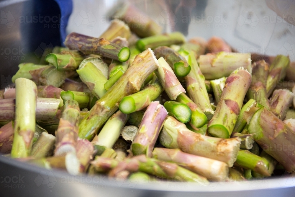 ends chopped off asparagus spears - Australian Stock Image