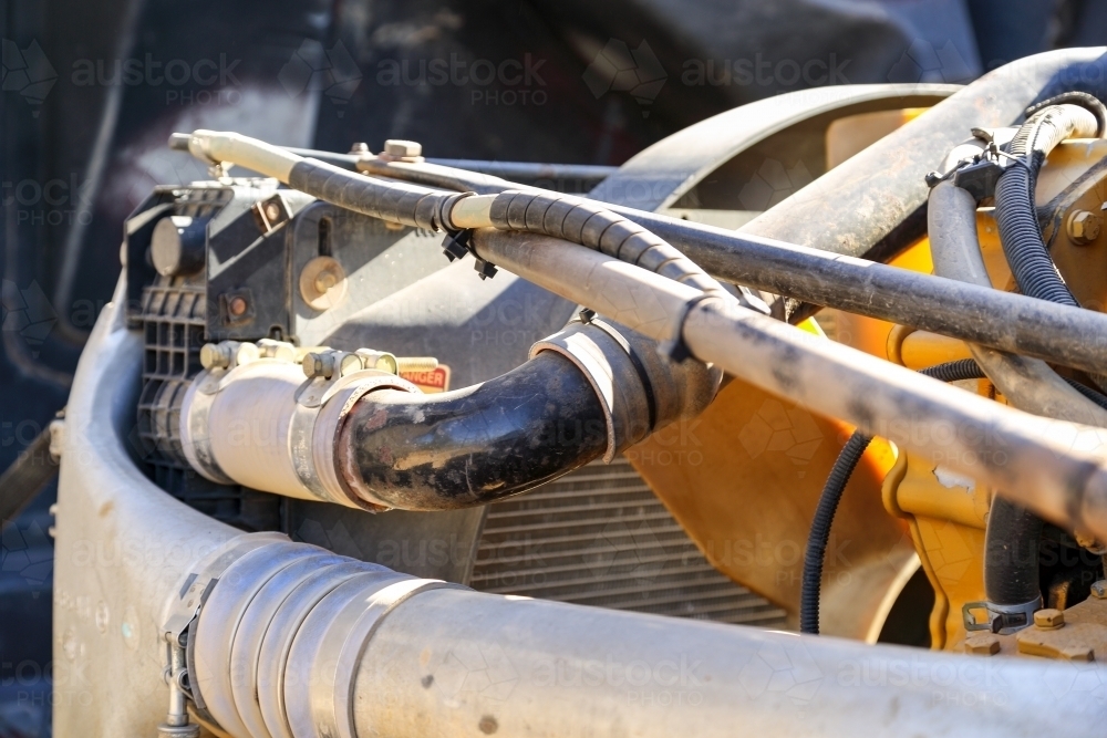 Engine compartment under the bonnet of a semi-trailer truck. - Australian Stock Image