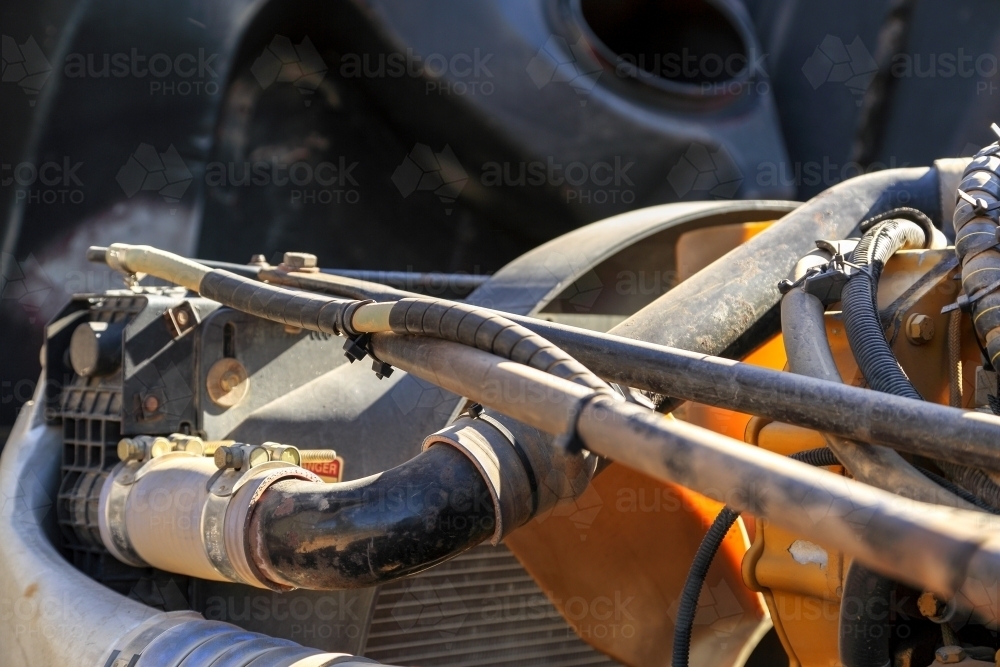 Engine compartment under the bonnet of a semi-trailer truck. - Australian Stock Image