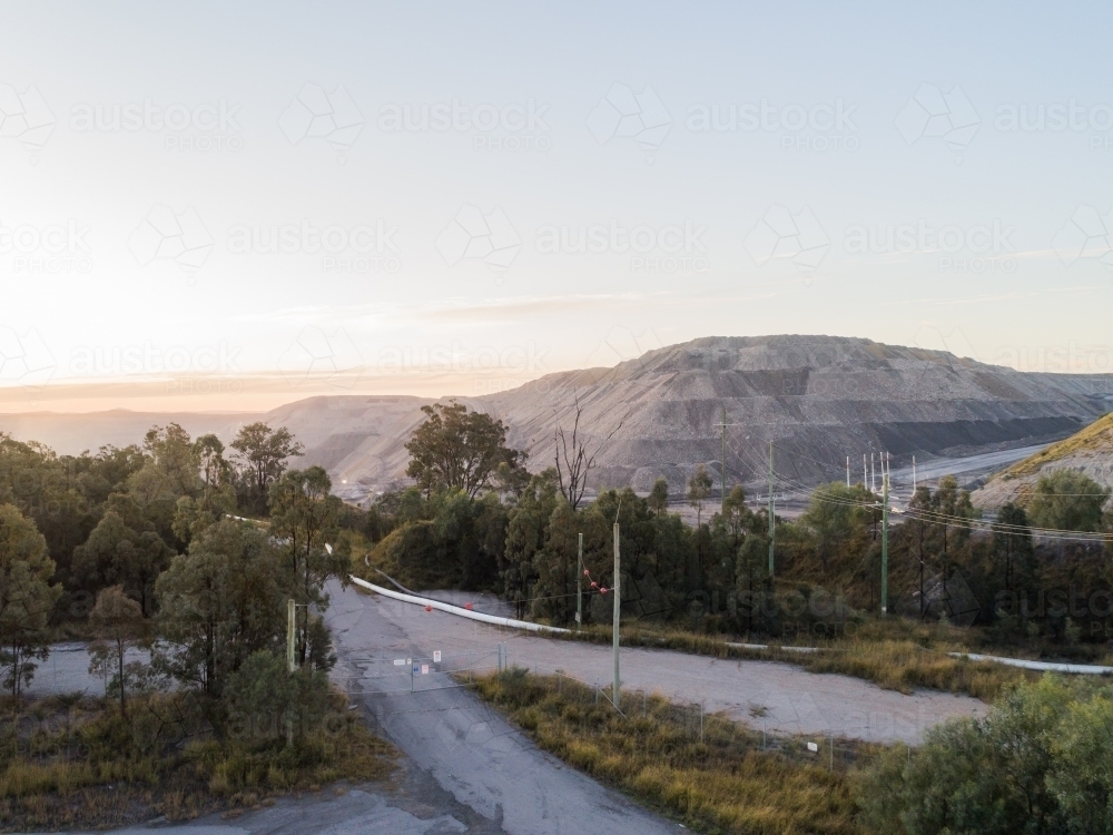 Entrance to open cut mine site at dusk Mount Thorley, NSW, Australia - Australian Stock Image