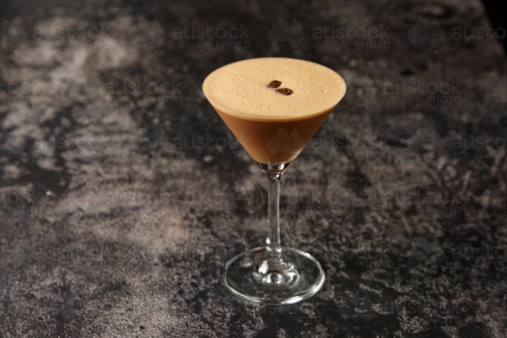 Espresso martini on table - Australian Stock Image