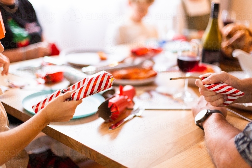 exploded christmas cracker after pulling - Australian Stock Image